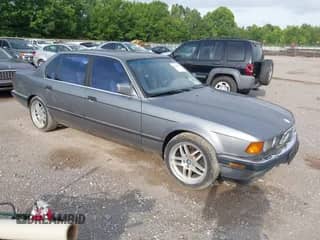 1994 BMW 7 Series with VIN WBAGD8323RDE87893, listed as a IAAI auction lot 42518003 with 196,154 mi miles and . Bid and sale history available at DreamBid. Image 1.