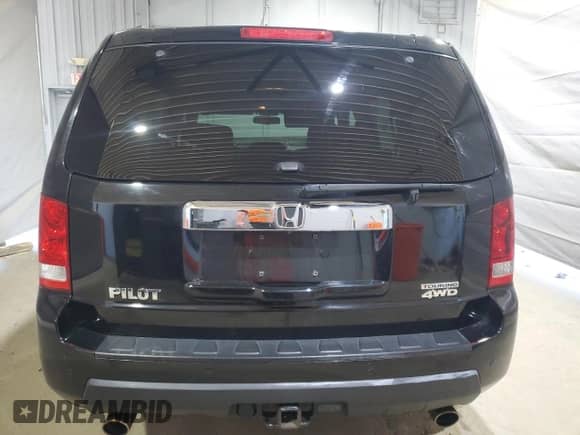 2010 Honda Pilot Touring с VIN 5FNYF4H91AB033815, выставлен на аукционе Copart как лот 65589255 с пробегом 197 143 миль миль и Списание • Salvage title. История ставок и продаж доступна на DreamBid. Изображение 6.