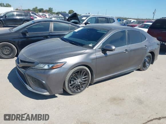 2021 Toyota Camry XSE with VIN 4T1K61AK7MU523281, listed as a IAAI auction lot 43469645 with 81,876 mi miles and . Bid and sale history available at DreamBid. Image 2.
