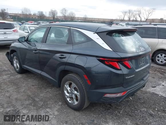 2022 Hyundai Tucson SE with VIN 5NMJACAE3NH000434, listed as a IAAI auction lot 41623118 with 54,781 mi miles and . Bid and sale history available at DreamBid. Image 3.