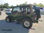 1998 Jeep Wrangler Sport z VIN 1J4FY19S5WP755118, wystawiony jako Copart lot #66572805 z przebiegiem 279 594 mil mil oraz Szkoda całkowita • Salvage title. Historia ofert i sprzedaży dostępna na DreamBid. Obrazek 2.