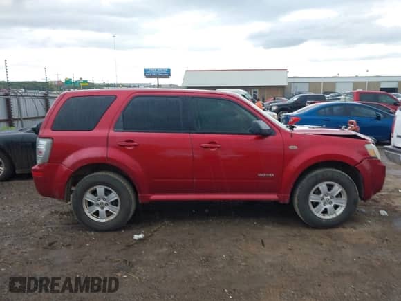 2008 Mercury Mariner with VIN 4M2CU91168KJ50296, listed as a IAAI auction lot 42385367 with 108,406 mi miles and . Bid and sale history available at DreamBid. Image 13.