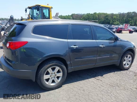 2012 Chevrolet Traverse 1LT z VIN 1GNKVGED9CJ277606, wystawiony jako IAAI lot #42864068 z przebiegiem 139 446 mil mil oraz . Historia ofert i sprzedaży dostępna na DreamBid. Obrazek 13.