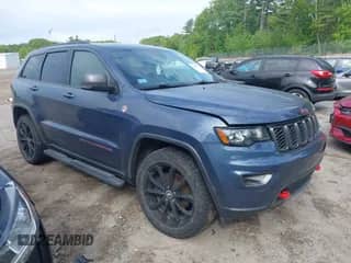 2020 Jeep Grand Cherokee Trailhawk with VIN 1C4RJFLGXLC218661, listed as a IAAI auction lot 42363213 with 61,444 mi miles and . Bid and sale history available at DreamBid. Image 1.