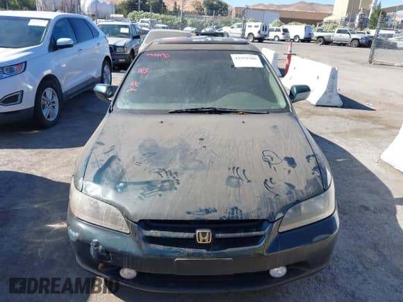 1999 Honda Accord EX with VIN 1HGCG1651XA010429, listed as a IAAI auction lot 42931580 with 453,774 mi miles and . Bid and sale history available at DreamBid. Image 6.