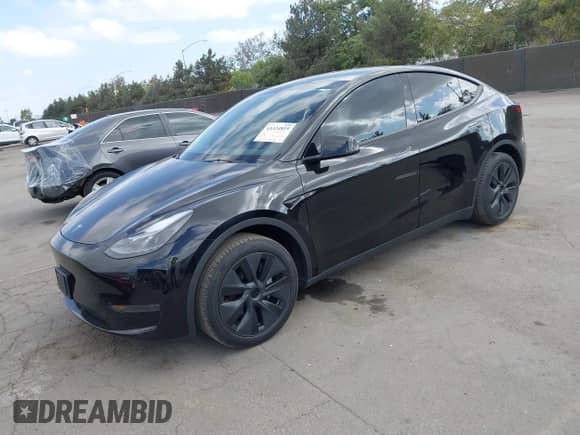 2024 Tesla Model Y with VIN 7SAYGDED8RF156984, listed as a IAAI auction lot 43324819 with 26,941 mi miles and . Bid and sale history available at DreamBid. Image 2.