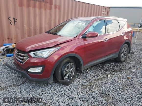 2016 Hyundai Santa Fe with VIN 5XYZU3LB1GG356956, listed as a Copart auction lot 69944795 with 72,117 mi miles and Salvage title. Bid and sale history available at DreamBid. Image 1.
