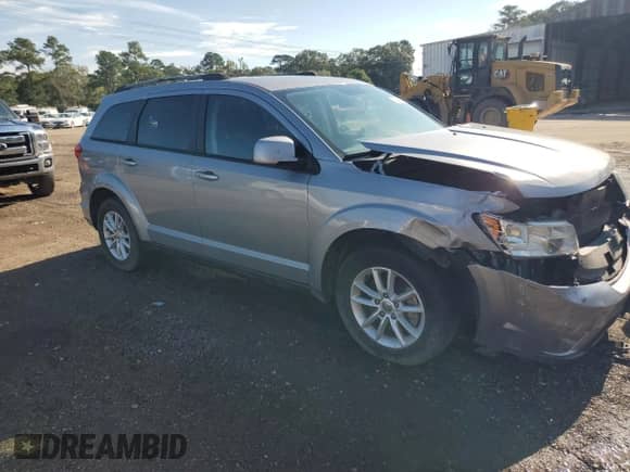 2017 Dodge Journey SXT with VIN 3C4PDDBG6HT574072, listed as a Copart auction lot 68840345 with 173,502 mi miles and Salvage title. Bid and sale history available at DreamBid. Image 4.
