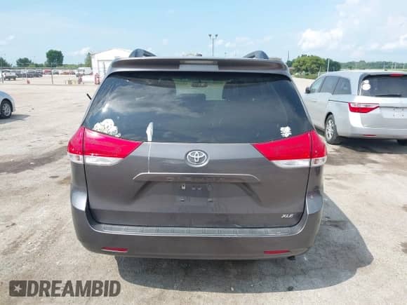 2012 Toyota Sienna XLE AAS with VIN 5TDYK3DC9CS242547, listed as a IAAI auction lot 42981571 with 156,662 mi miles and . Bid and sale history available at DreamBid. Image 16.