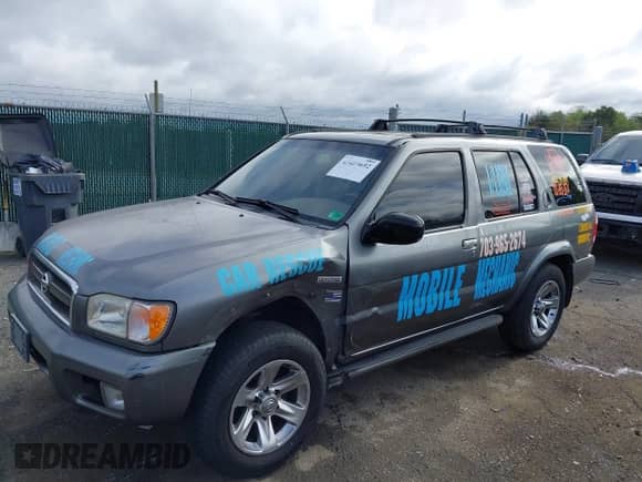 2004 Nissan Pathfinder SE z VIN JN8DR09Y94W909054, wystawiony jako IAAI lot #43419692 z przebiegiem 186 677 mil mil oraz . Historia ofert i sprzedaży dostępna na DreamBid. Obrazek 2.