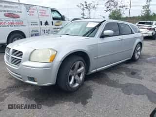 2005 Dodge Magnum RT with VIN 2D4GV58225H613973, listed as a IAAI auction lot 43385974 with 156,042 mi miles and . Bid and sale history available at DreamBid. Image 2.