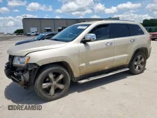 2012 Jeep Grand Cherokee Limited z VIN 1C4RJEBG8CC137430, wystawiony jako Copart lot #62833655 z przebiegiem 133 892 mil mil oraz Szkoda całkowita • Salvage title. Historia ofert i sprzedaży dostępna na DreamBid. Obrazek 1.