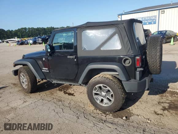 2013 Jeep Wrangler Sport with VIN 1C4AJWAG7DL655003, listed as a Copart auction lot 61839615 with 66,539 mi miles and Salvage title. Bid and sale history available at DreamBid. Image 2.