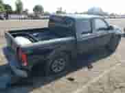 2004 Nissan Frontier XE with VIN 1N6ED27T64C477426, listed as a Copart auction lot 68329535 with 132,259 mi miles and Salvage title. Bid and sale history available at DreamBid. Image 3.