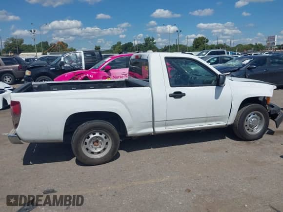 2012 Chevrolet Colorado Work Truck z VIN 1GCCSBF9XC8130009, wystawiony jako IAAI lot #43287788 z przebiegiem 151 906 mil mil oraz . Historia ofert i sprzedaży dostępna na DreamBid. Obrazek 12.