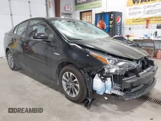 2022 Toyota Prius L Eco with VIN JTDKAMFU2N3186072, listed as a IAAI auction lot 42486252 with 5,887 mi miles and . Bid and sale history available at DreamBid. Image 1.