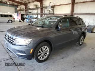 2018 Volkswagen Tiguan S с VIN 3VV0B7AX0JM116152, выставлен на аукционе Copart как лот 86630065 с пробегом 89 978 миль миль и Списание • Salvage title. История ставок и продаж доступна на DreamBid. Изображение 1.