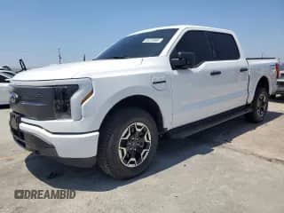 2023 Ford F-150 Lightning Pro with VIN 1FTVW1EL3PWG54236, listed as a Copart auction lot 66233905 with 15,374 mi miles and Salvage title. Bid and sale history available at DreamBid. Image 1.