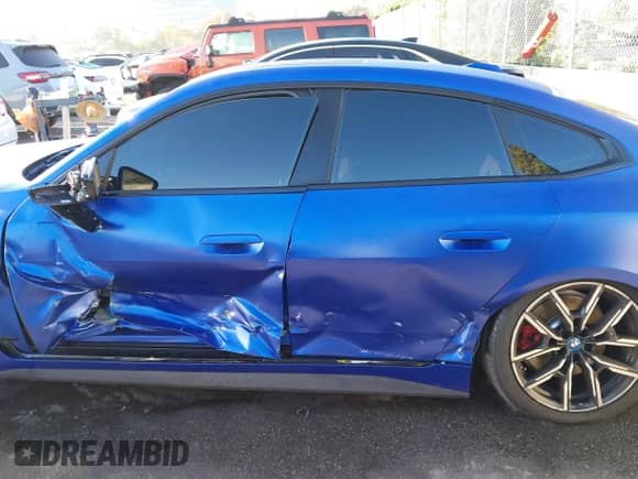 2024 BMW i4 eDrive40 with VIN WBY73AW07RFS43770, listed as a IAAI auction lot 41689504 with 14,684 mi miles and . Bid and sale history available at DreamBid. Image 14.