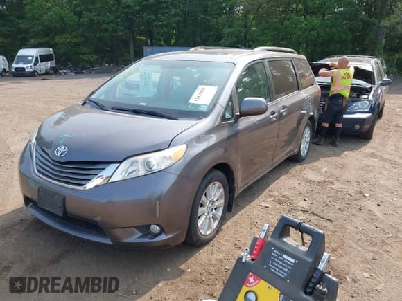 2012 Toyota Sienna XLE with VIN 5TDDK3DC6CS032969, listed as a IAAI auction lot 42423883 with 122,676 mi miles and . Bid and sale history available at DreamBid. Image 2.