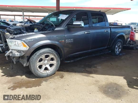 2017 Ram 1500 Laramie z VIN 1C6RR7NT7HS817210, wystawiony jako IAAI lot #42087758 z przebiegiem 189 230 mil mil oraz . Historia ofert i sprzedaży dostępna na DreamBid. Obrazek 2.