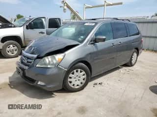 2007 Honda Odyssey Touring с VIN 5FNRL388X7B122032, выставлен на аукционе Copart как лот 71498185 с пробегом 215 467 миль миль и Списание • Salvage title. История ставок и продаж доступна на DreamBid. Изображение 1.