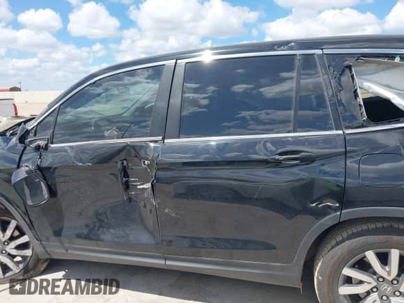 2020 Honda Pilot EX-L with VIN 5FNYF5H51LB002957, listed as a IAAI auction lot 43273685 with 72,681 mi miles and . Bid and sale history available at DreamBid. Image 15.