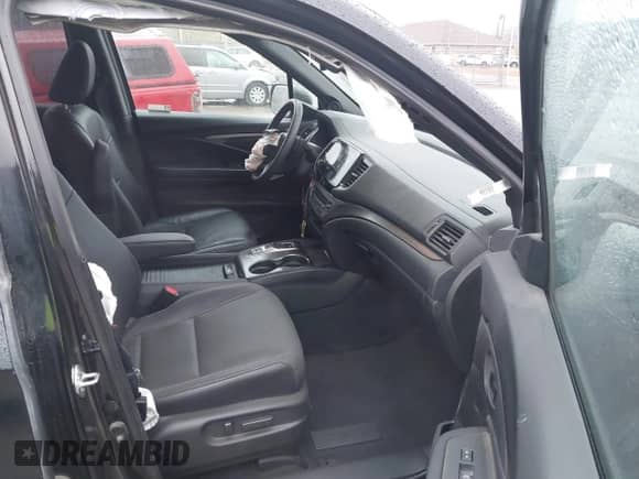 2023 Honda Passport EX-L with VIN 5FNYF8H56PB024816, listed as a IAAI auction lot 41785311 with 31,604 mi miles and . Bid and sale history available at DreamBid. Image 5.
