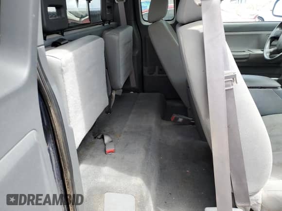2006 Dodge Dakota с VIN 1D3HW42N46S612420, выставлен на аукционе Copart как лот 63764385 с пробегом 168 909 миль миль и Списание • Salvage title. История ставок и продаж доступна на DreamBid. Изображение 10.