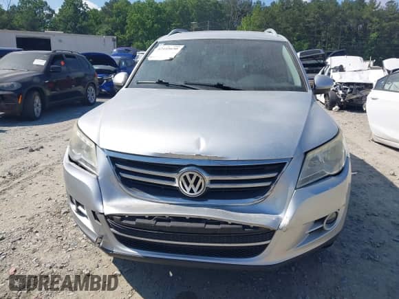 2011 Volkswagen Tiguan S with VIN WVGAV7AX0BW550630, listed as a IAAI auction lot 42445650 with 185,176 mi miles and . Bid and sale history available at DreamBid. Image 12.