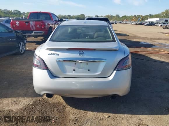 2013 Nissan Maxima SV z VIN 1N4AA5APXDC818212, wystawiony jako IAAI lot #43353776 z przebiegiem 132 989 mil mil oraz . Historia ofert i sprzedaży dostępna na DreamBid. Obrazek 17.