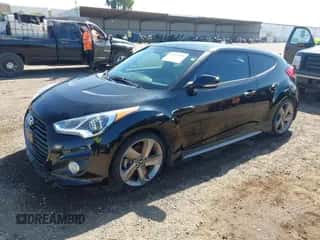 2014 Hyundai Veloster Turbo with VIN KMHTC6AEXEU203961, listed as a IAAI auction lot 43547096 with 77,384 mi miles and . Bid and sale history available at DreamBid. Image 2.
