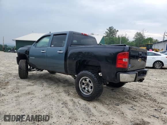 2011 Chevrolet Silverado 1500 LTZ with VIN 3GCPKTE25BG156814, listed as a Copart auction lot 59096265 with 210,404 mi miles and Salvage title. Bid and sale history available at DreamBid. Image 2.