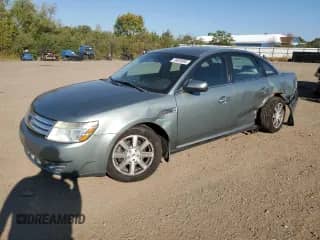 2008 Ford Taurus SEL with VIN 1FAHP24W28G151889, listed as a Copart auction lot 70920005 with 179,490 mi miles and Salvage title. Bid and sale history available at DreamBid. Image 1.