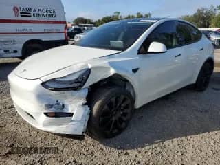 2020 Tesla Model Y Long Range с VIN 5YJYGDEF5LF002903, выставлен на аукционе Copart как лот 82212595 с пробегом 73 151 миль миль и Списание • Salvage title. История ставок и продаж доступна на DreamBid. Изображение 1.