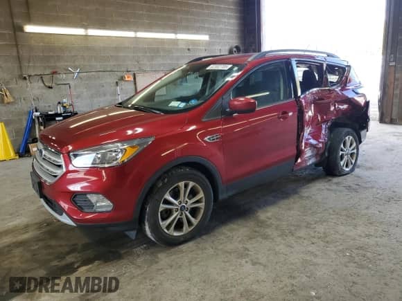 2018 Ford Escape SE с VIN 1FMCU9GDXJUD35058, выставлен на аукционе Copart как лот 82302705 с пробегом 62 136 миль миль и Списание • Salvage title. История ставок и продаж доступна на DreamBid. Изображение 1.