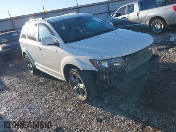 2015 Dodge Journey Crossroad with VIN 3C4PDCGG5FT639266, listed as a IAAI auction lot 41108296 with 126,376 mi miles and . Bid and sale history available at DreamBid. Image 1.
