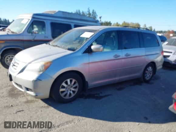 2008 Honda Odyssey EX z VIN 5FNRL38438B068846, wystawiony jako IAAI lot #43451580 z przebiegiem 185 466 mil mil oraz . Historia ofert i sprzedaży dostępna na DreamBid. Obrazek 2.