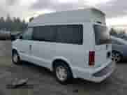 1999 Chevrolet Astro z VIN 1GNEL19W1XB186342, wystawiony jako Copart lot #84715104 z przebiegiem 119 803 mil mil oraz Czysty tytuł • Clean title. Historia ofert i sprzedaży dostępna na DreamBid. Obrazek 2.