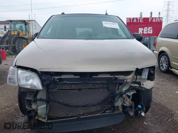 2004 Chevrolet Venture LT z VIN 1GNDX13E74D107191, wystawiony jako IAAI lot #42512603 z przebiegiem 183 883 mil mil oraz . Historia ofert i sprzedaży dostępna na DreamBid. Obrazek 12.