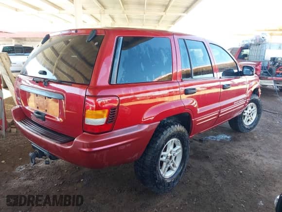 2004 Jeep Grand Cherokee Laredo with VIN 1J4GW48S34C379651, listed as a IAAI auction lot 43466624 with 175,652 mi miles and . Bid and sale history available at DreamBid. Image 4.