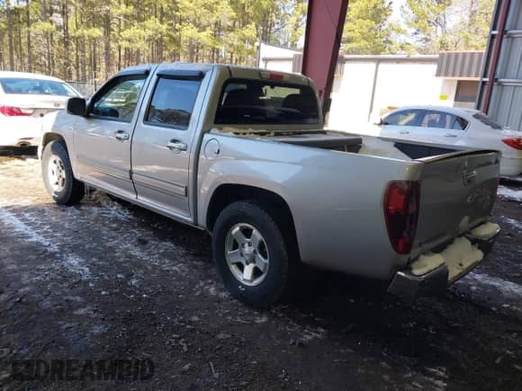 2010 Chevrolet Colorado 1LT z VIN 1GCDSCDE0A8101688, wystawiony jako IAAI lot #41631414 z przebiegiem 220 308 mil mil oraz . Historia ofert i sprzedaży dostępna na DreamBid. Obrazek 3.