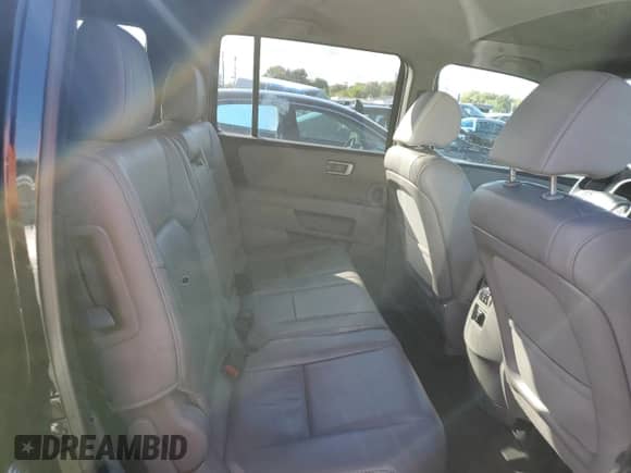 2014 Honda Pilot EX-L с VIN 5FNYF4H51EB057261, выставлен на аукционе Copart как лот 82290625 с пробегом 218 785 миль миль и Чистый • Clean title. История ставок и продаж доступна на DreamBid. Изображение 11.