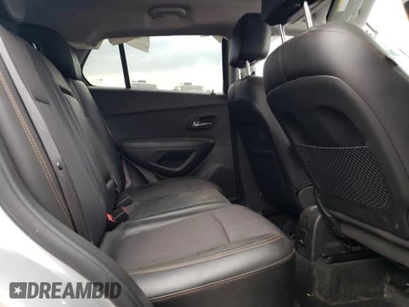 2018 Chevrolet Trax LT z VIN KL7CJLSB9JB531694, wystawiony jako Copart lot #71555135 z przebiegiem Nie podano mil oraz Szkoda całkowita • Salvage title. Historia ofert i sprzedaży dostępna na DreamBid. Obrazek 10.