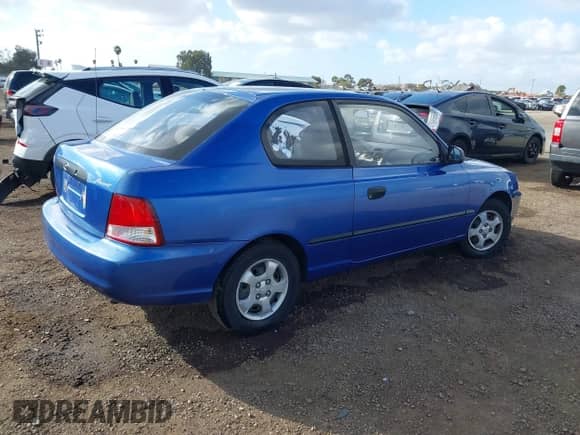 2001 Hyundai Accent z VIN KMHCF35G91U106987, wystawiony jako IAAI lot #41562779 z przebiegiem 69 762 mil mil oraz . Historia ofert i sprzedaży dostępna na DreamBid. Obrazek 4.