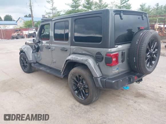 2022 Jeep Wrangler Unlimited Sahara with VIN 1C4JJXP64NW232223, listed as a IAAI auction lot 42641049 with 32,903 mi miles and . Bid and sale history available at DreamBid. Image 3.