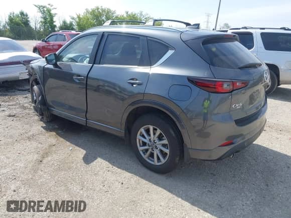 2025 Mazda CX-5 S Preferred z VIN JM3KFBCL9S0599564, wystawiony jako IAAI lot #42701760 z przebiegiem 15 526 mil mil oraz . Historia ofert i sprzedaży dostępna na DreamBid. Obrazek 3.