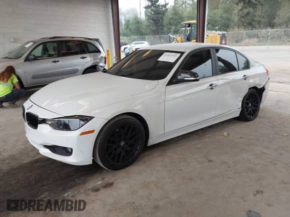 2014 BMW 3 Series 328i with VIN WBA3C1C57EK117469, listed as a IAAI auction lot 43207455 with 77,275 mi miles and . Bid and sale history available at DreamBid. Image 17.