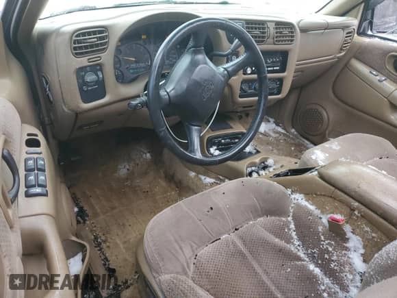 2001 Chevrolet Blazer LS с VIN 1GNDT13W812162843, выставлен на аукционе Copart как лот 43563975 с пробегом 139 454 миль миль и Списание • Salvage title. История ставок и продаж доступна на DreamBid. Изображение 8.