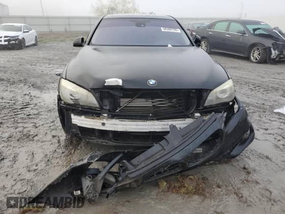 2012 BMW 7 Series with VIN WBAKX6C57CC197201, listed as a Copart auction lot 50388795 with 75,086 mi miles and Salvage title. Bid and sale history available at DreamBid. Image 5.